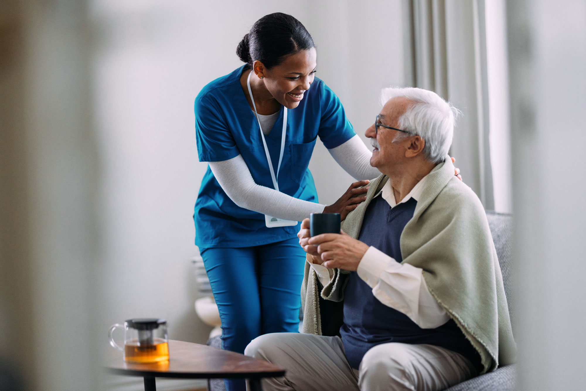Medical provider comforting patient Medical provider comforting patient