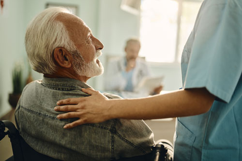 Medical provider comforting patient