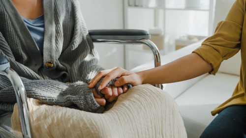 Medical provider comforting patient