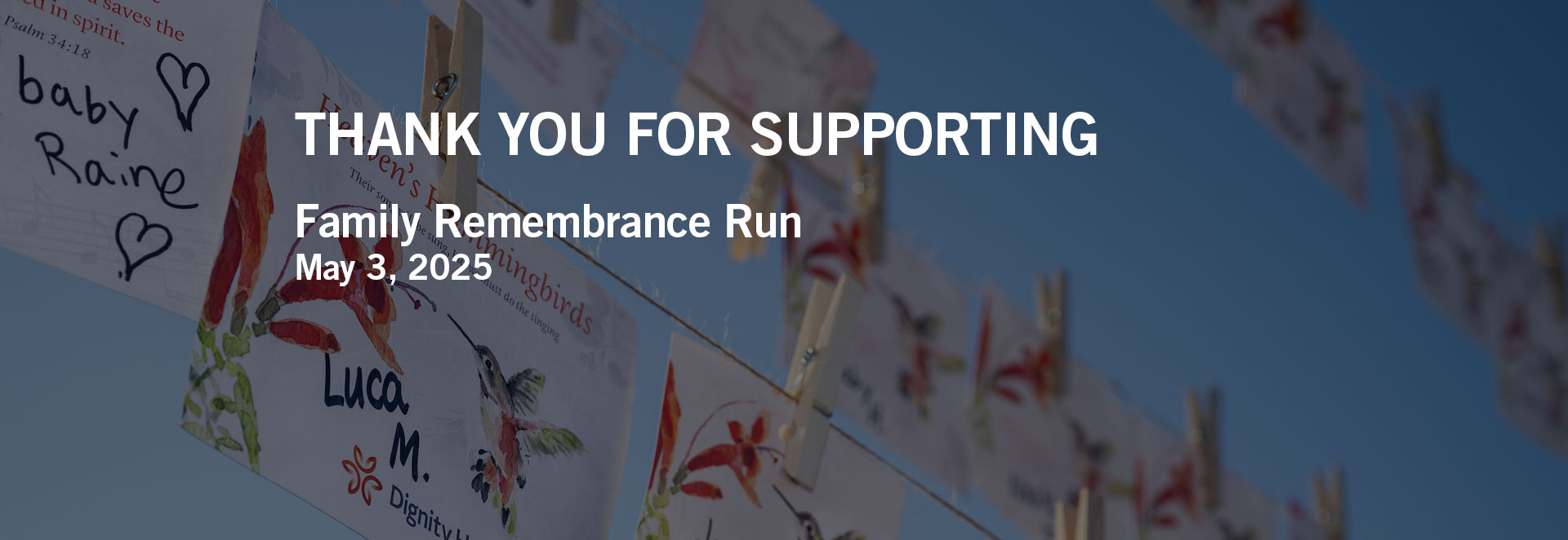Banner - Family Remembrance Run - with cards of children's names on them.